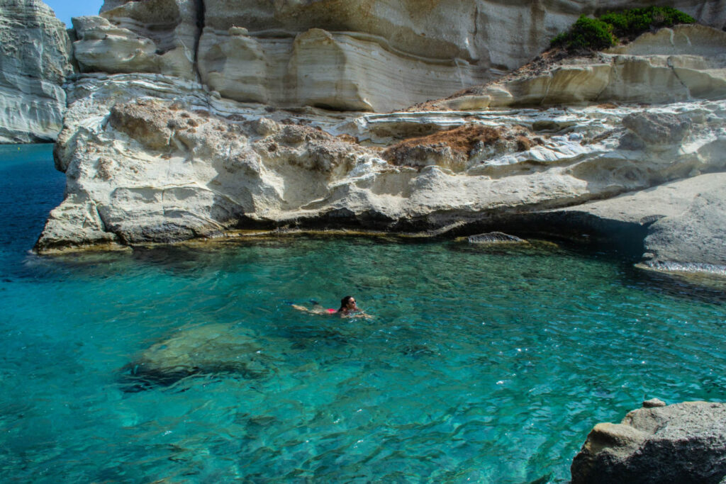 kleftiko beach milos island blue water greece